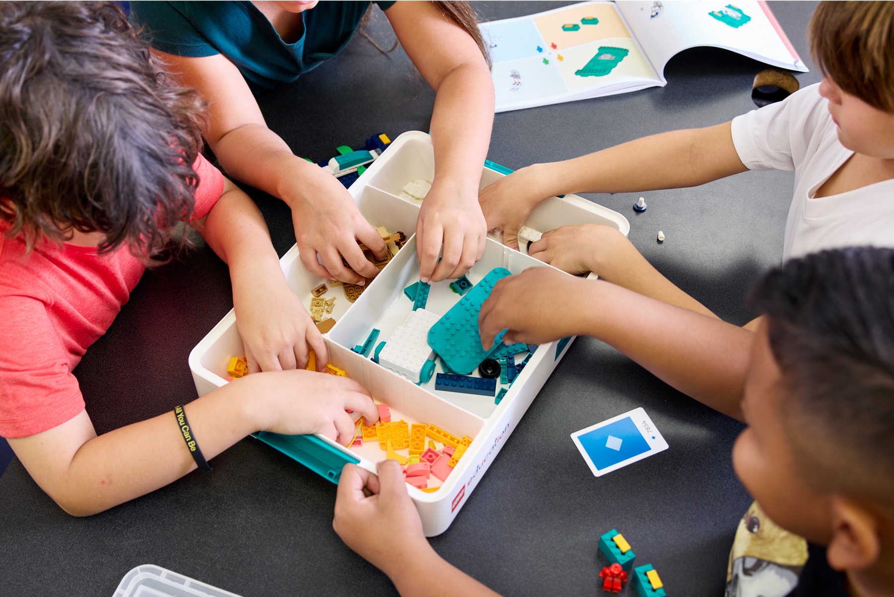 Sci_45621_Lifestyle_four students building_3000x2000.png