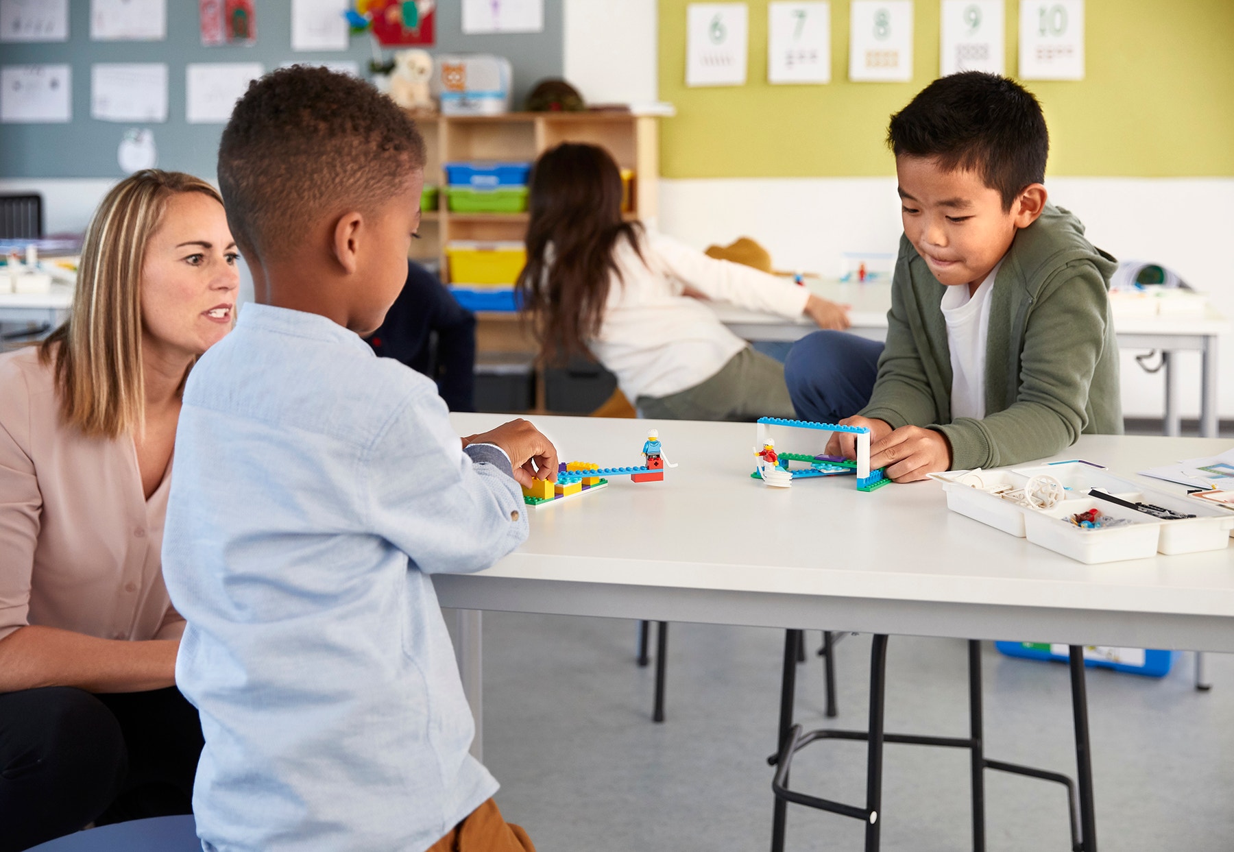Students building a physical science set