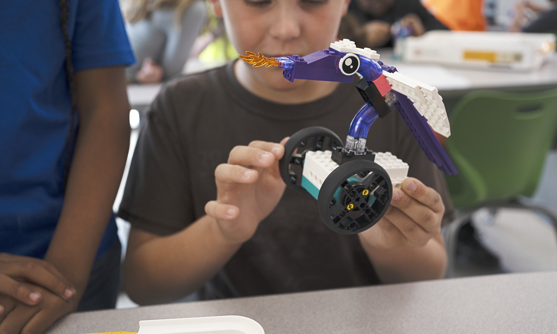 CSAI_45521_Lifestyle_Student holding a lesson model_4000x2400.png