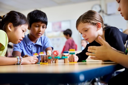 Students learning with a LEGO Education Science kit.