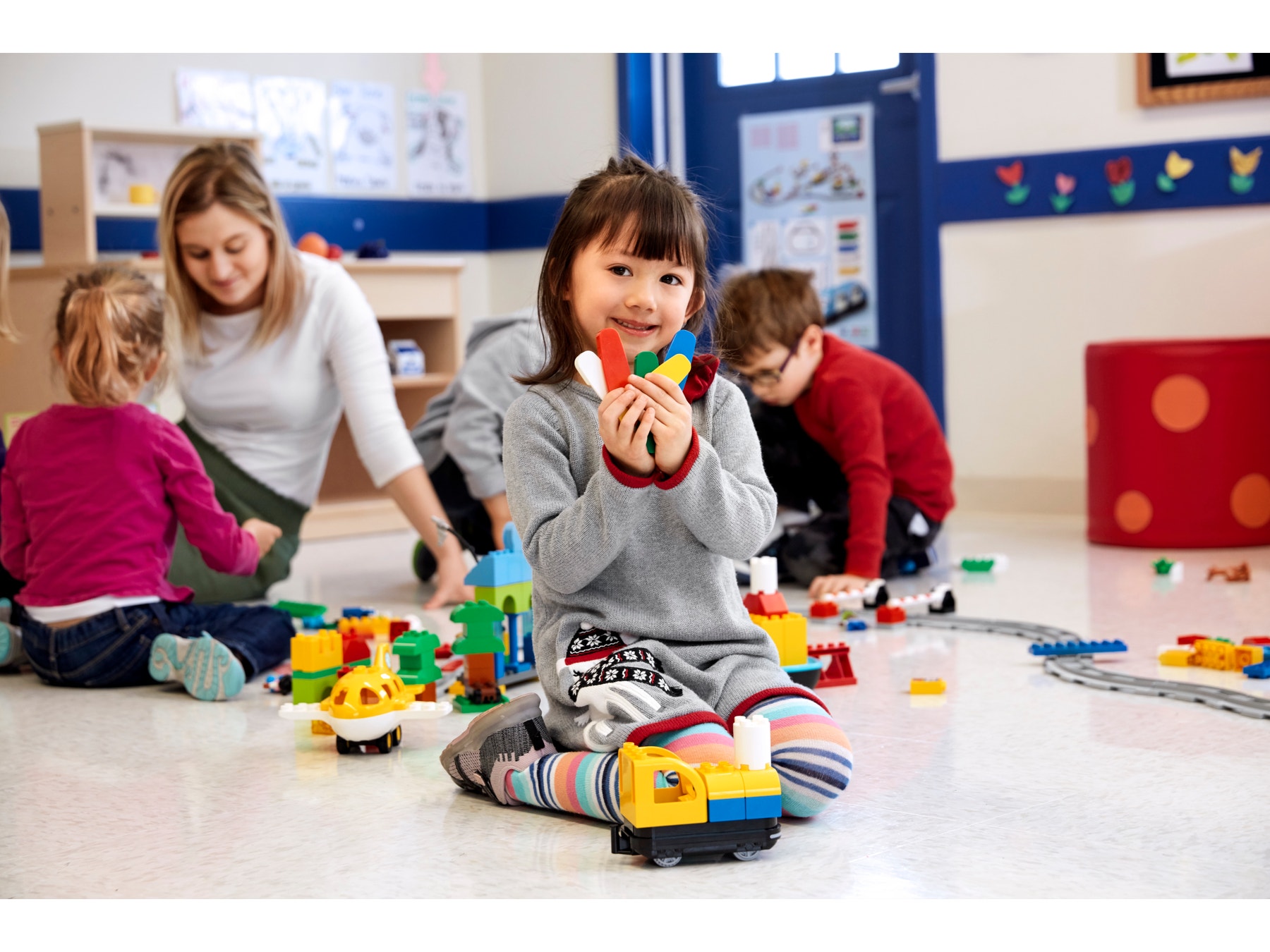 Students building programmable sets in classroom