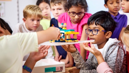 Students learning with a LEGO Education Science kit.